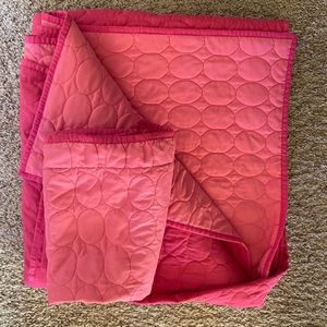 Pink quilted comforter